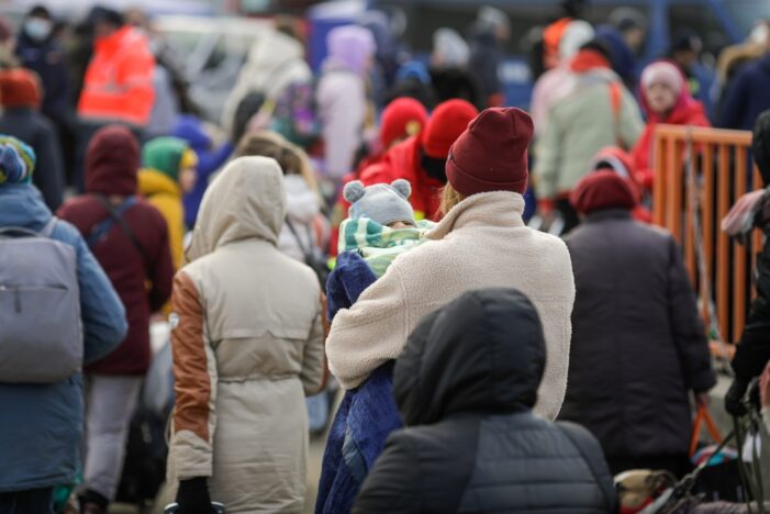 Shelter Shuffle Leaves Hundreds of Migrants Waiting Outside In Below-Freezing Temperatures